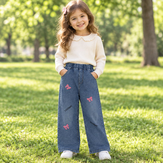 JEANS DE NIÑA CON ESTAMPADO DE LAZOS